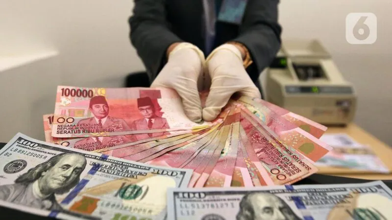Rupiah Ambruk ke Rp 18.129 per Dolar AS, IHSG Ikut Turun Hampir 3%
